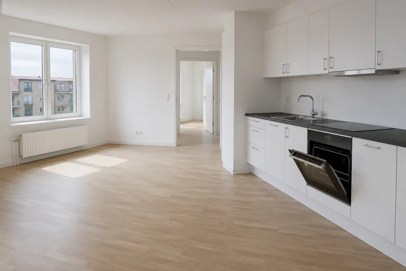 Empty flat ready for the move-out inspection in West Jutland, with a cleaned kitchen and oven